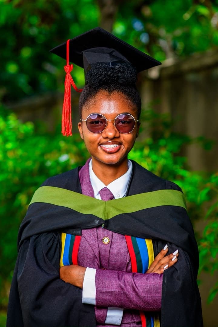 Gown, sash and mortarboard