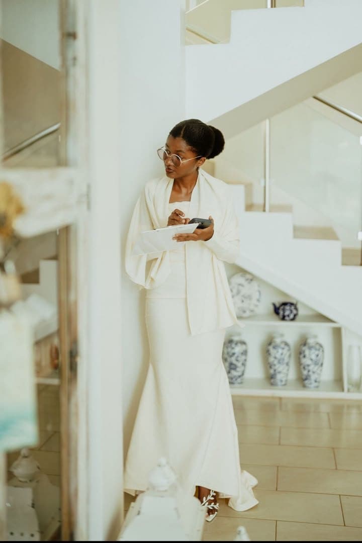 Hosting indoors, white gown