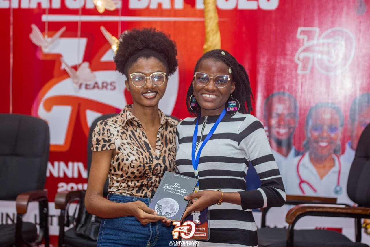 Handing over a copy at Literature Day