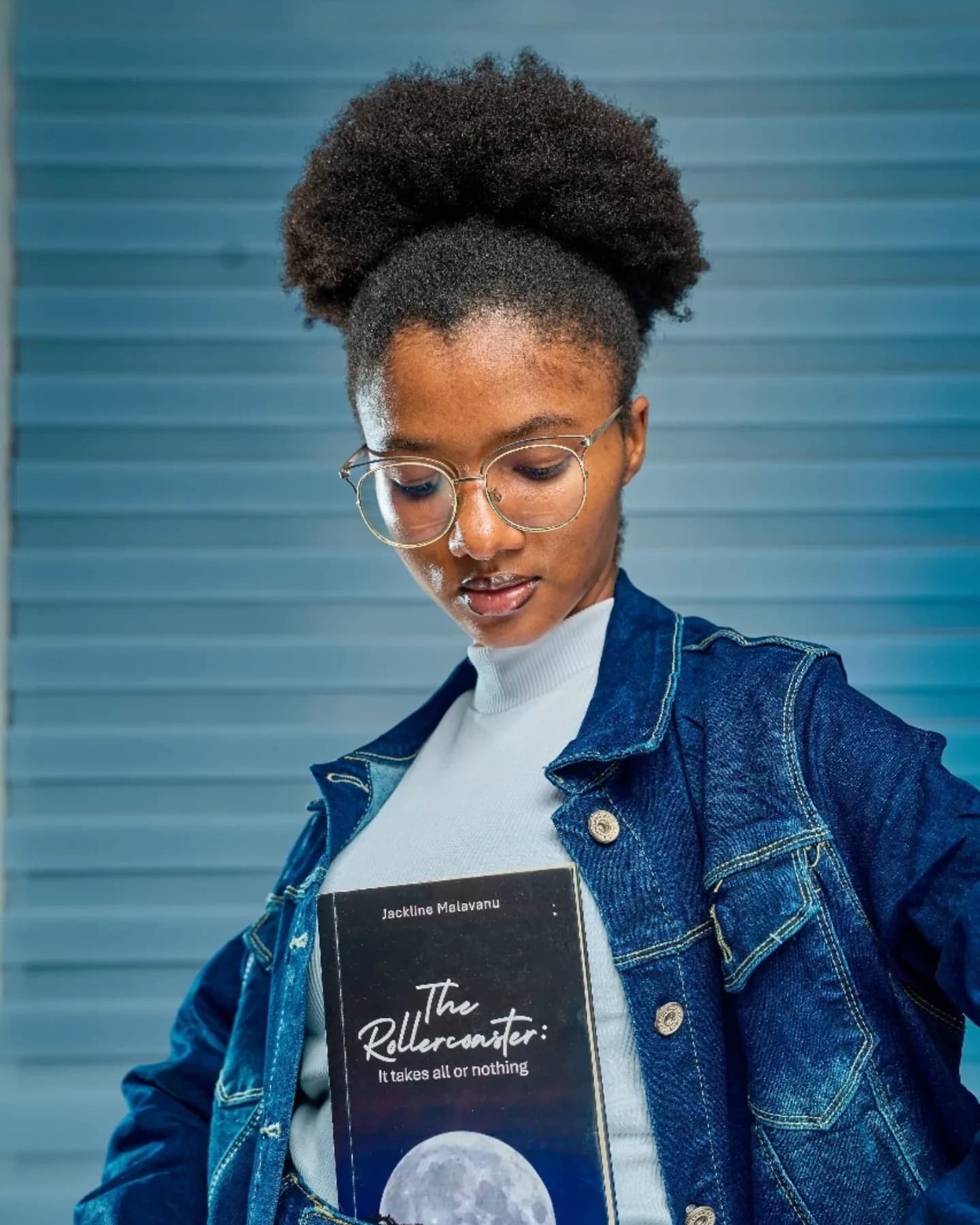Reading her own book back